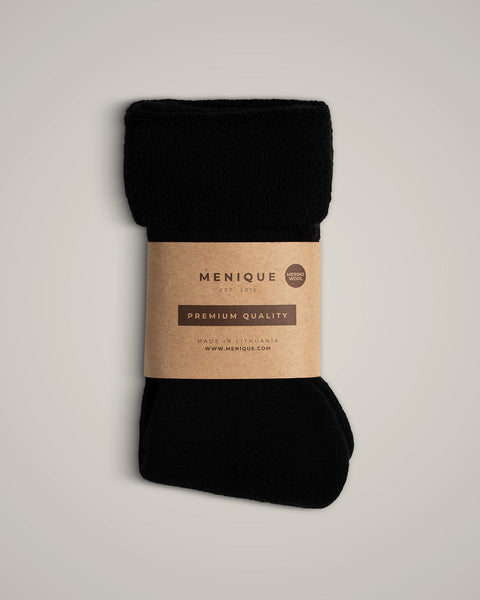 los calcetines sherpa de merino para mujer en negro.