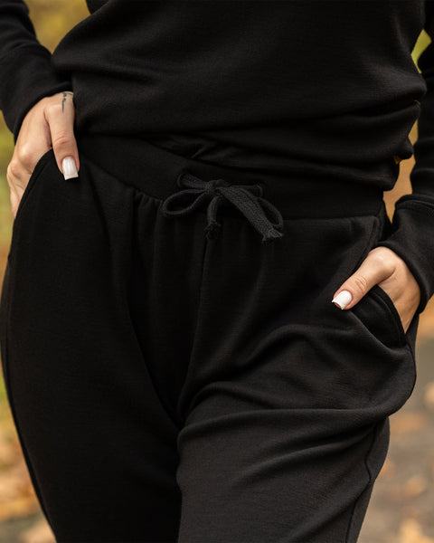 Conjunto para mujer Merino 250 de camiseta con cremallera en el cuello y pantalones deportivos jogger negro